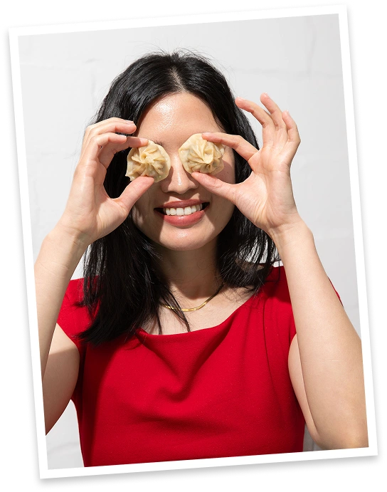 Cecilia holding dim sum